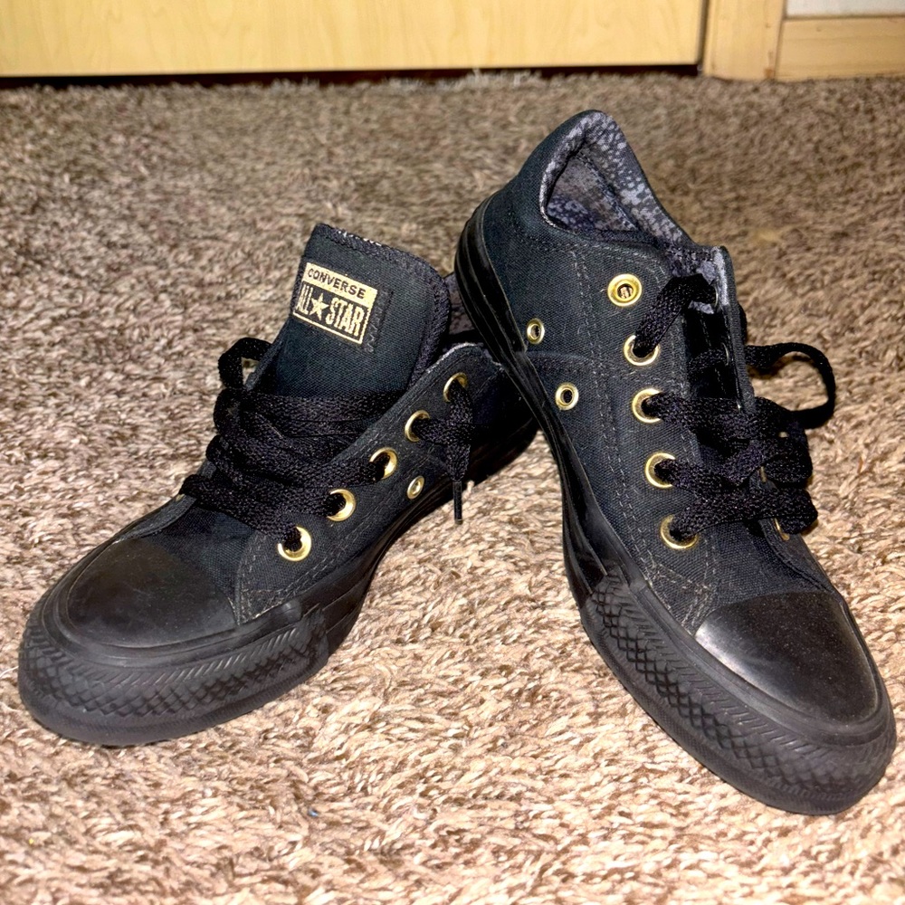 Converse Chuck Taylor black shoes with gold detail. Size 5 women’s